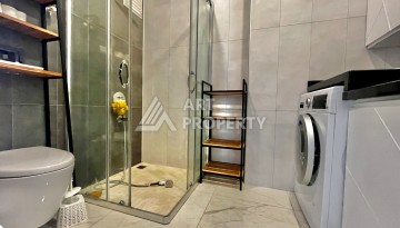 Просторная квартира 3+1 с отдельной кухней и видом на море в центре Алании - Ракурс 19