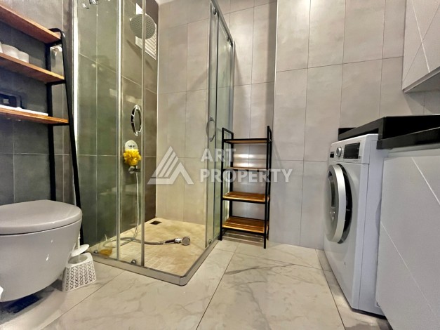 Просторная квартира 3+1 с отдельной кухней и видом на море в центре Алании - Ракурс 18