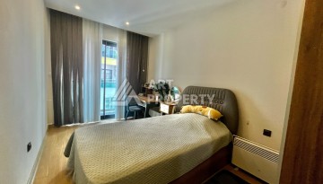 Просторная квартира 3+1 с отдельной кухней и видом на море в центре Алании - Ракурс 24