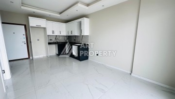 Новая квартира 1+1 с видом на море в районе Каргыджак, первая линия - Ракурс 9