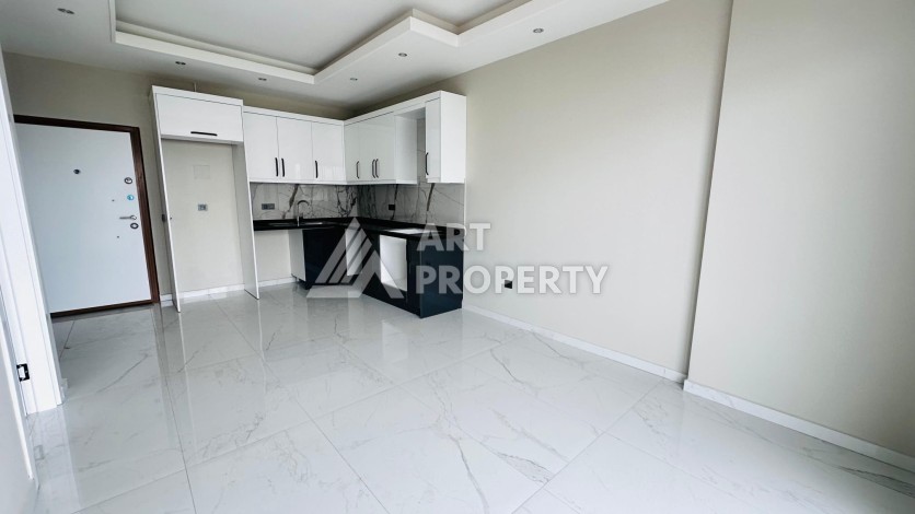 Новая квартира 1+1 с видом на море в районе Каргыджак, первая линия - Ракурс 8