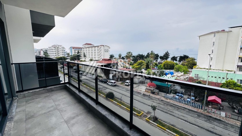 Новая квартира 1+1 с видом на море в районе Каргыджак, первая линия - Ракурс 1