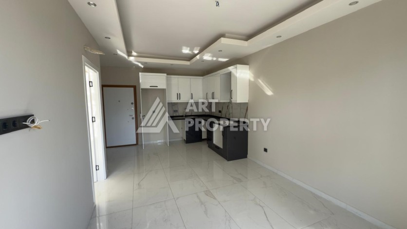 Новая квартира 1+1 в доме 2024 года в районе Каргыджак, 70 метров до моря - Ракурс 3