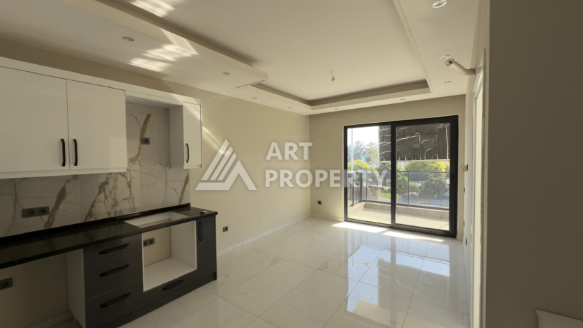 Новая квартира 1+1 в доме 2024 года в районе Каргыджак, 70 метров до моря - Ракурс 5