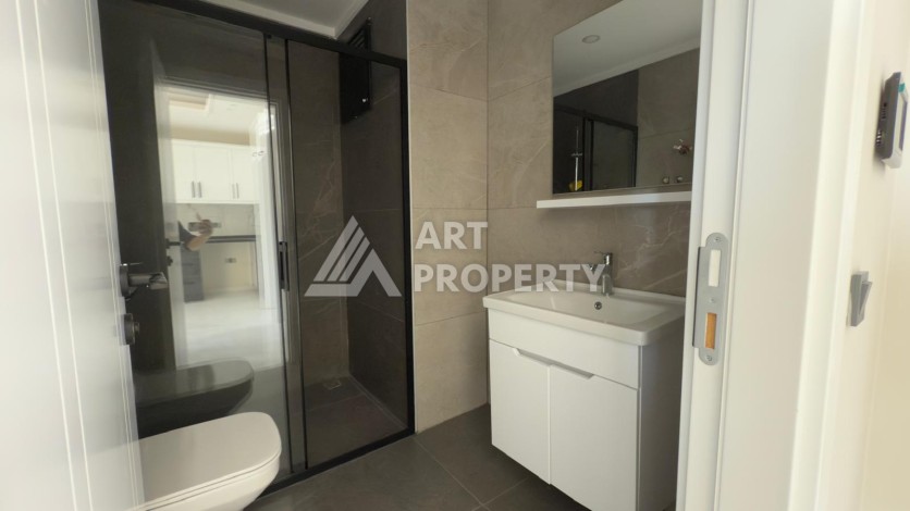 Новая квартира 1+1 в доме 2024 года в районе Каргыджак, 70 метров до моря - Ракурс 7