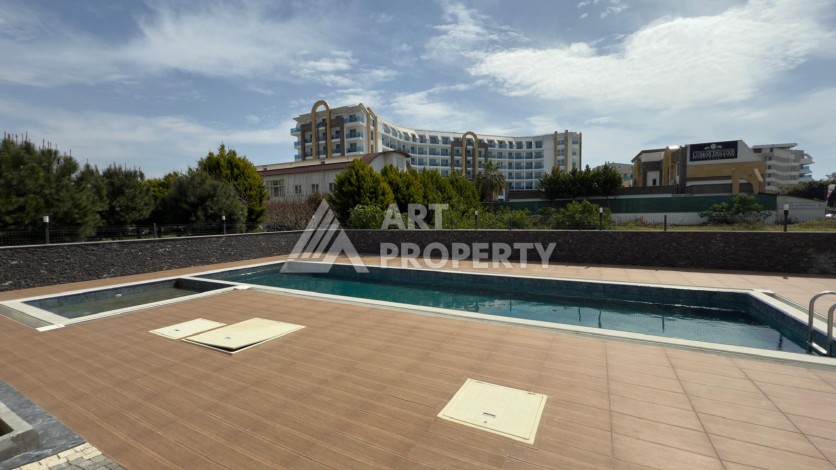 Новая квартира 1+1 в доме 2024 года в районе Каргыджак, 70 метров до моря - Ракурс 8