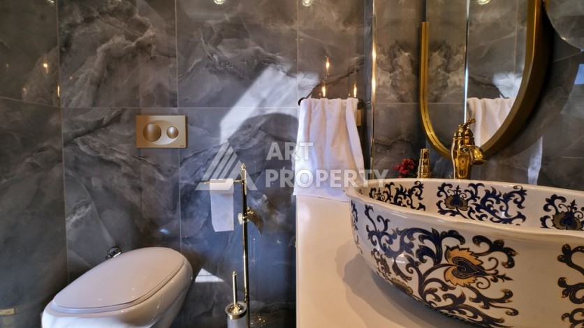 Эксклюзивная вилла 4+2 с панорамными видами на море и горы в районе Оба, Алания - Ракурс 45