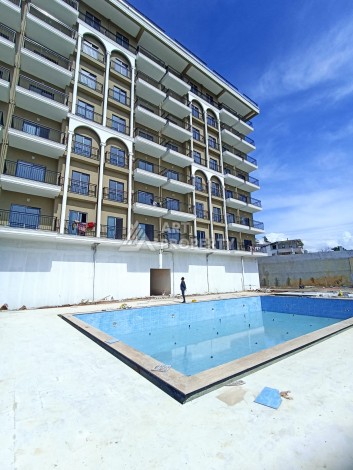 Недорогая квартира 1+1 в новом комплексе 2024 года в районе Авсалар - Ракурс 10