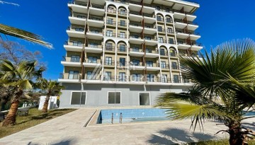 Недорогая квартира 1+1 в новом комплексе 2024 года в районе Авсалар - Ракурс 13