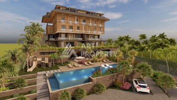 Современная камерная резиденция с квартирами 2+1 и 3+1 от 94 до 186 кв.м. Джикджилли, Алания - Ракурс 1