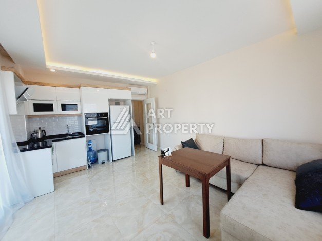 Меблированная квартира 1+1 в Тосмуре, 54 кв.м. Выгодное предложение. - Ракурс 22