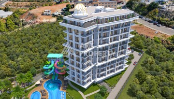 Квартиры 1+1 и пентхаус 2+1 в открытом для ВНЖ районе Тосмур, от 60 кв.м. - Ракурс 9