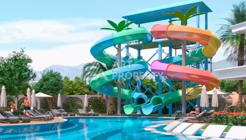 Квартиры 1+1 и пентхаус 2+1 в открытом для ВНЖ районе Тосмур, от 60 кв.м. - Ракурс 17