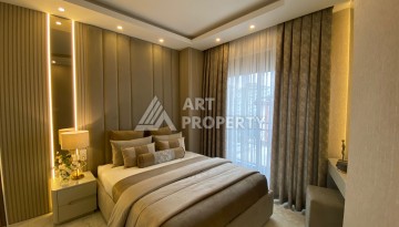 Квартиры 1+1 и пентхаус 2+1 в открытом для ВНЖ районе Тосмур, от 60 кв.м. - Ракурс 32