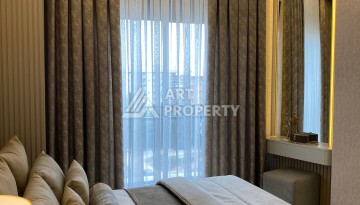 Квартиры 1+1 и пентхаус 2+1 в открытом для ВНЖ районе Тосмур, от 60 кв.м. - Ракурс 35