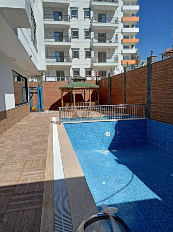 Двухкомнатная квартира в новом доме в 350 метрах от моря в Махмутлар, 53 м2 - Ракурс 7