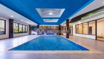 Квартира 1+1 с высокими потолками в районе Каргыджак, 250 м до моря - Ракурс 2