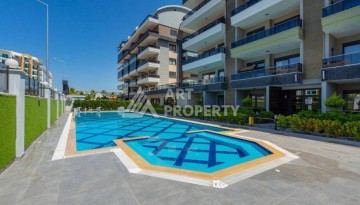 Квартира 1+1 с высокими потолками в районе Каргыджак, 250 м до моря - Ракурс 3