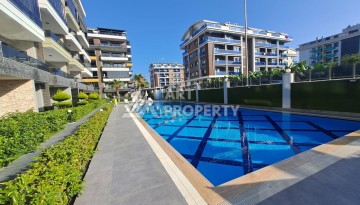 Квартира 1+1 с высокими потолками в районе Каргыджак, 250 м до моря - Ракурс 4