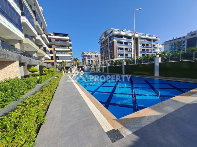 Квартира 1+1 с высокими потолками в районе Каргыджак, 250 м до моря - Ракурс 3