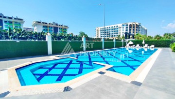 Квартира 1+1 с высокими потолками в районе Каргыджак, 250 м до моря - Ракурс 5