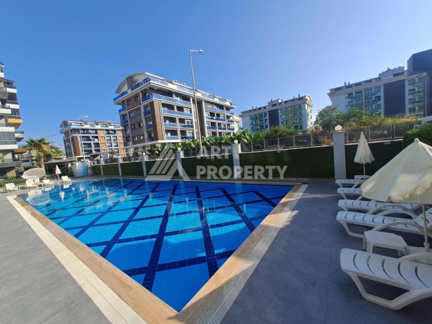 Квартира 1+1 с высокими потолками в районе Каргыджак, 250 м до моря - Ракурс 5