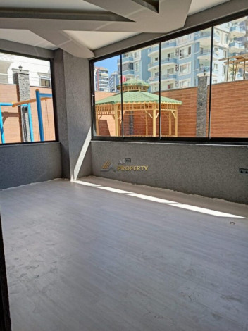 Двухкомнатная квартира в новом доме в 350 метрах от моря в Махмутлар, 53 м2 - Ракурс 9