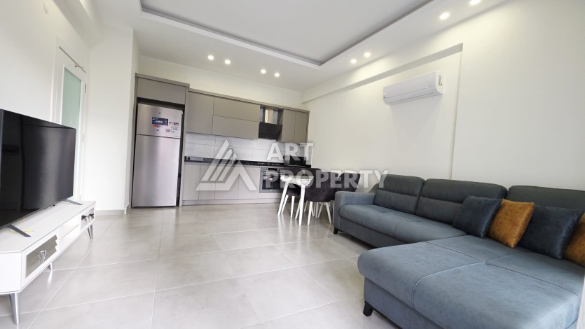 Новая квартира 1+1 в районе Махмутлар, 500 м до моря - Ракурс 3