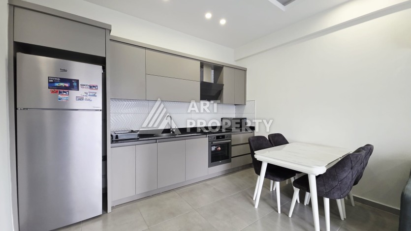 Новая квартира 1+1 в районе Махмутлар, 500 м до моря - Ракурс 17