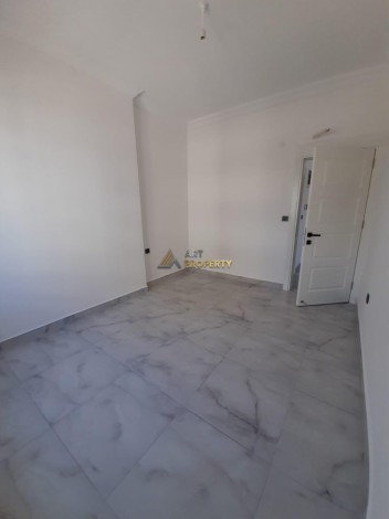 Двухкомнатная квартира в новом доме в 350 метрах от моря в Махмутлар, 53 м2 - Ракурс 12