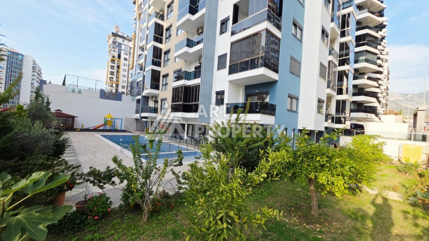 Новая квартира 1+1 в районе Махмутлар, 500 м до моря - Ракурс 40