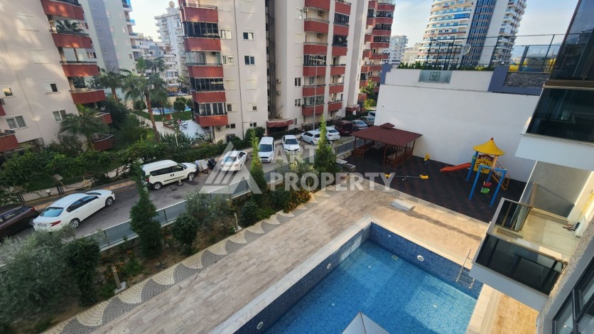 Новая квартира 1+1 в районе Махмутлар, 500 м до моря - Ракурс 43