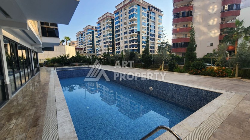 Новая квартира 1+1 в районе Махмутлар, 500 м до моря - Ракурс 49