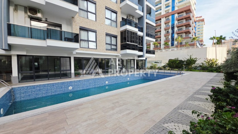 Новая квартира 1+1 в районе Махмутлар, 500 м до моря - Ракурс 50