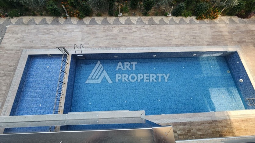 Новая квартира 1+1 в районе Махмутлар, 500 м до моря - Ракурс 54