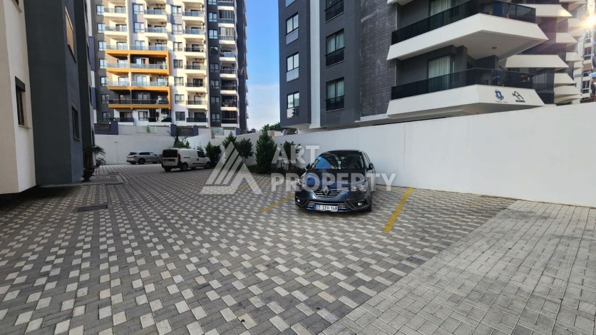 Новая квартира 1+1 в районе Махмутлар, 500 м до моря - Ракурс 56