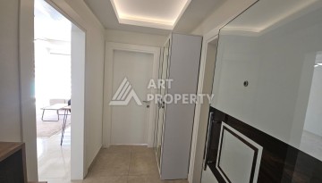 Квартира 1+1 в комплексе с отельной инфраструктурой, район Махмутлар, 500 м до моря - Ракурс 3