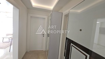 Квартира 1+1 в комплексе с отельной инфраструктурой, район Махмутлар, 500 м до моря - Ракурс 5