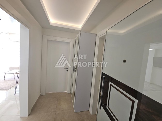 Квартира 1+1 в комплексе с отельной инфраструктурой, район Махмутлар, 500 м до моря - Ракурс 4