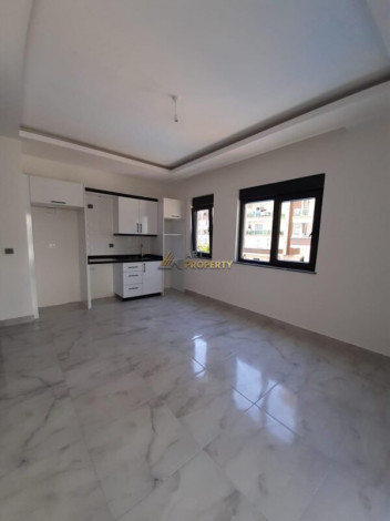 Двухкомнатная квартира в новом доме в 350 метрах от моря в Махмутлар, 53 м2 - Ракурс 17