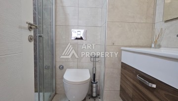 Квартира 1+1 в комплексе с отельной инфраструктурой, район Махмутлар, 500 м до моря - Ракурс 7