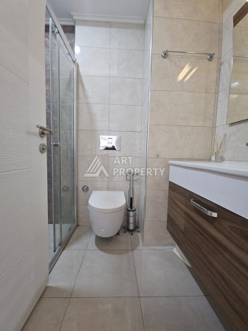 Квартира 1+1 в комплексе с отельной инфраструктурой, район Махмутлар, 500 м до моря - Ракурс 6