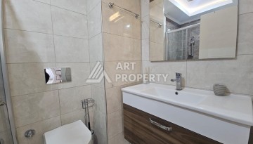 Квартира 1+1 в комплексе с отельной инфраструктурой, район Махмутлар, 500 м до моря - Ракурс 8