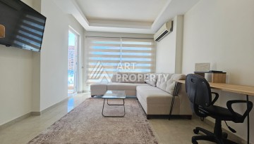 Квартира 1+1 в комплексе с отельной инфраструктурой, район Махмутлар, 500 м до моря - Ракурс 11