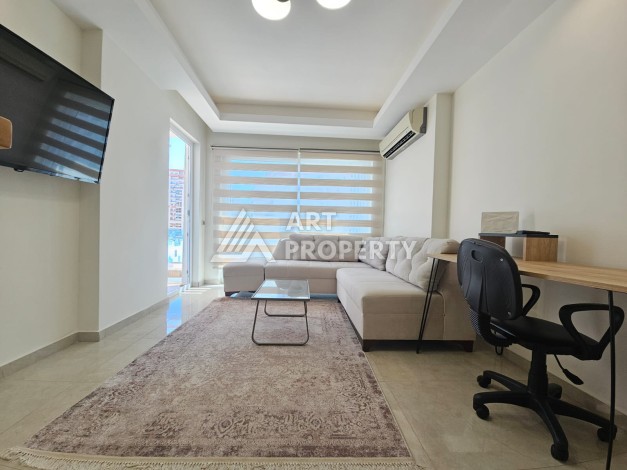 Квартира 1+1 в комплексе с отельной инфраструктурой, район Махмутлар, 500 м до моря - Ракурс 10