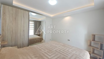 Квартира 1+1 в комплексе с отельной инфраструктурой, район Махмутлар, 500 м до моря - Ракурс 13