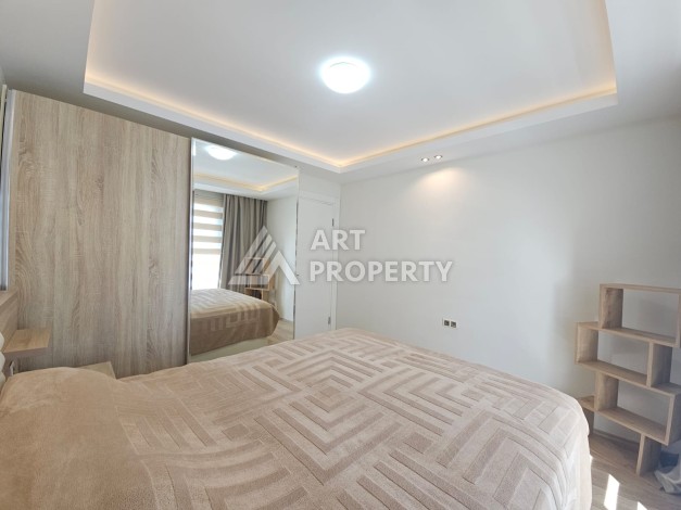 Квартира 1+1 в комплексе с отельной инфраструктурой, район Махмутлар, 500 м до моря - Ракурс 12