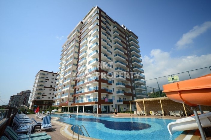 Просторная квартира 1+1 в Махмутларе, 600 метров до пляжа - Ракурс 0