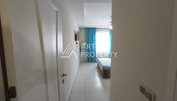 Просторная квартира 1+1 в Махмутларе, 600 метров до пляжа - Ракурс 12