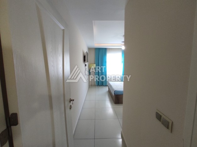 Просторная квартира 1+1 в Махмутларе, 600 метров до пляжа - Ракурс 11